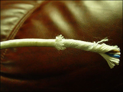 Tekstilomfletning tr&aelig;kkes tilbage.